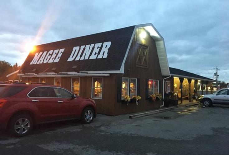 Outside view of Diner with cars in parking lot