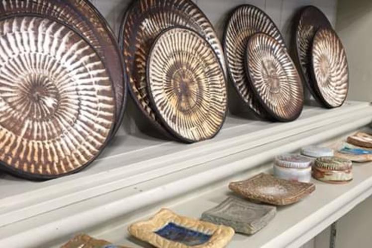 Ceramic Plates on Shelf