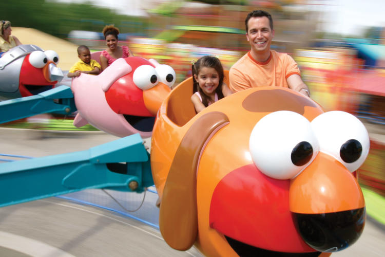 Sesame Place father and daughter on flying fish