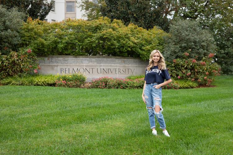 Abby Stephens in front of Belmont University sign