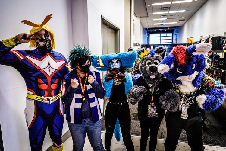 Group of attendees in full character costumes
