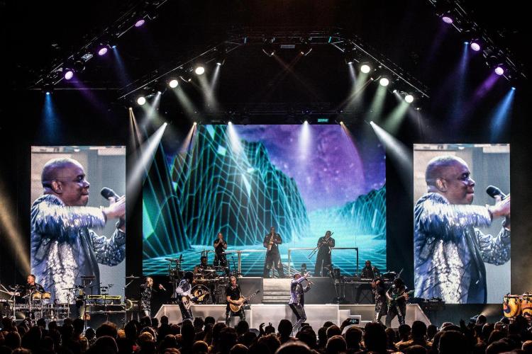 Concert on stage in amphitheater at night