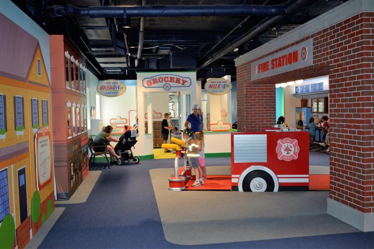 Fire and grocery exhibits with fire truck