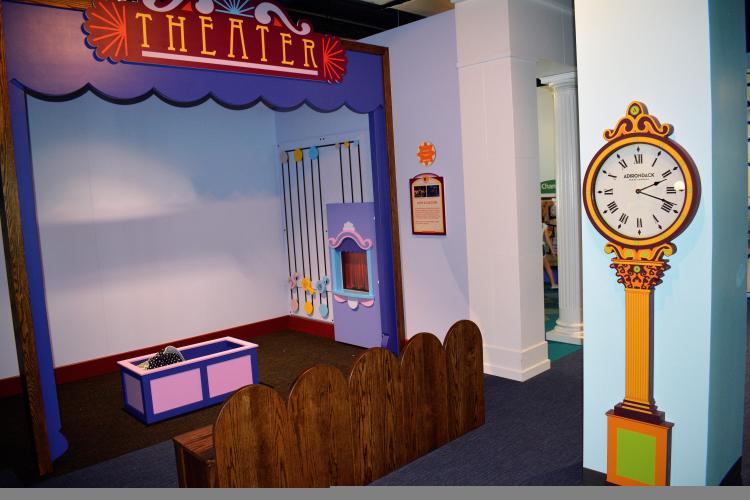 Theatre stage with replica of ADK Trust clock