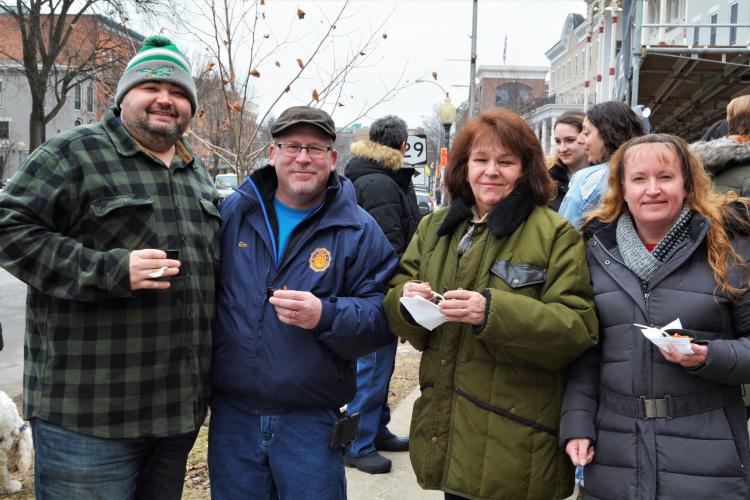 Group on street posing with chowders