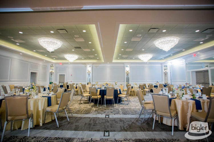 Large empty ballroom with tables set