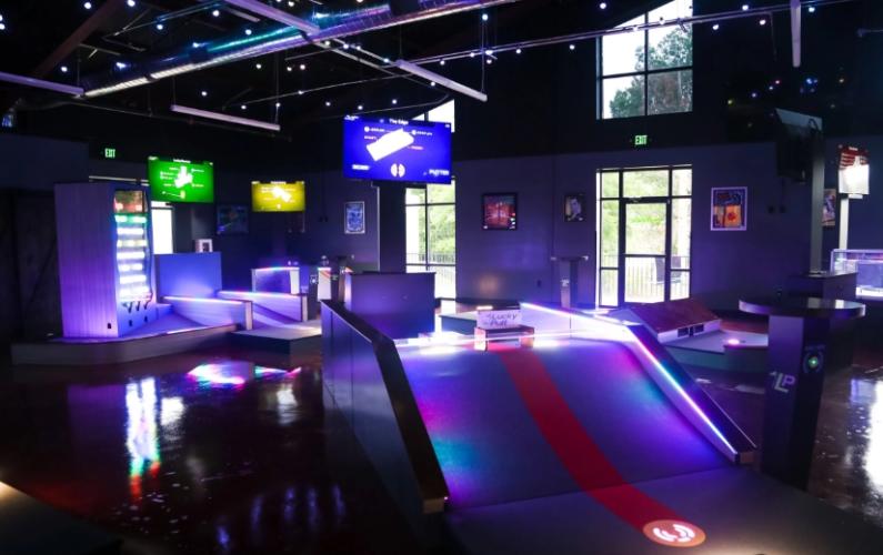 A glow-in-the-dark indoor mini golf course