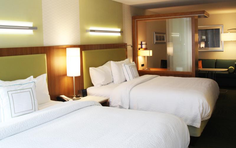 Two-queen hotel room in Bloomington