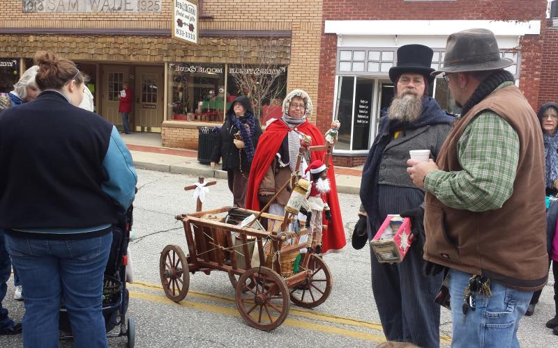 Victorian characters on the street at Mooresville's Victorian Christmas Celebration.