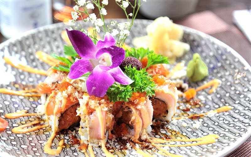 Plate of sushi with floral decoration from Wasabi Restaurant in Saratoga Springs, NY
