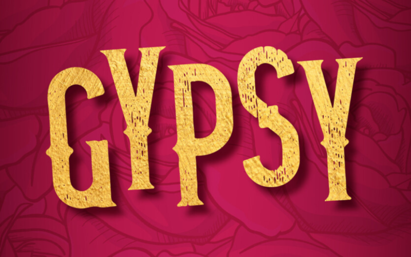 "Gypsy" is in yellow text on a hot pink background to promote the Broadway show