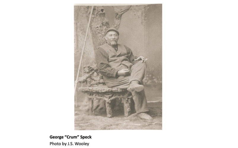 B&W photo of George Crum sitting on a bench