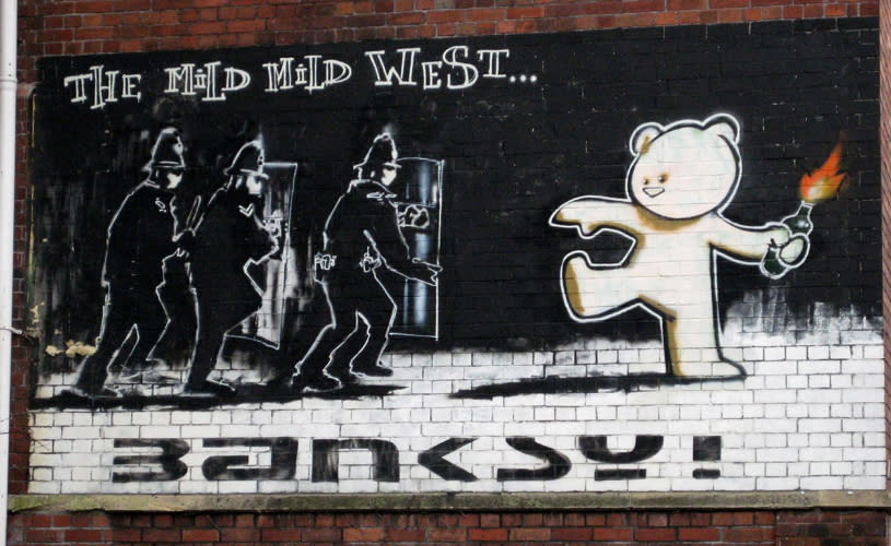 Banksy mural with teddy bear throwing molotov cocktail - credit Paul Box