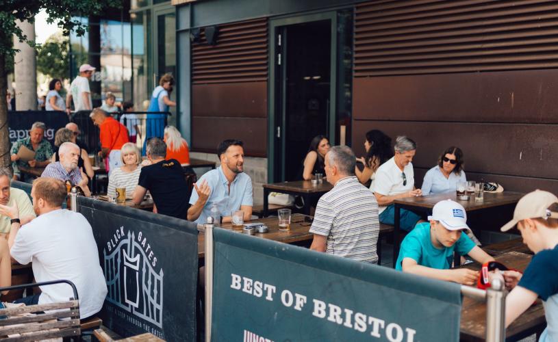People sitting at tables at the Junction bar - credit Shotaway