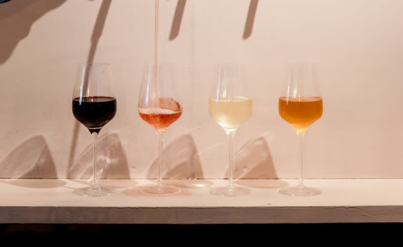 Glasses of wine being poured - credit Kym Grimshaw Photography