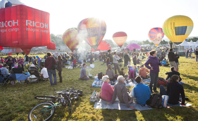 Crowds watching balloons at Bristol International Balloon Fiesta - credit Paul Box