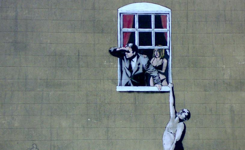 Banksy's 'Well Hung Lover' on Park Street, central Bristol