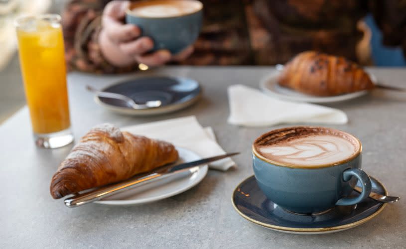 Croissant, coffee and orange juice