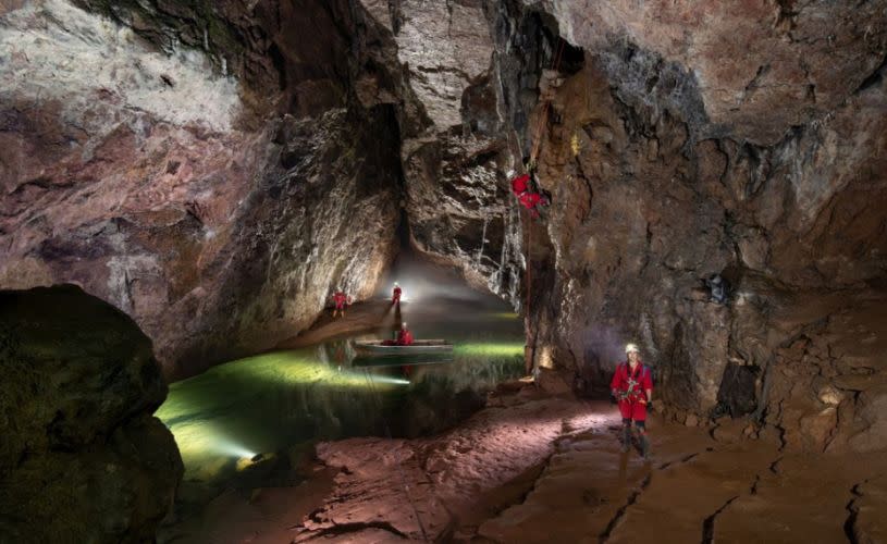 A group on the Wild Wookey caving experience in Wookey Hole - credit Wookey Hole