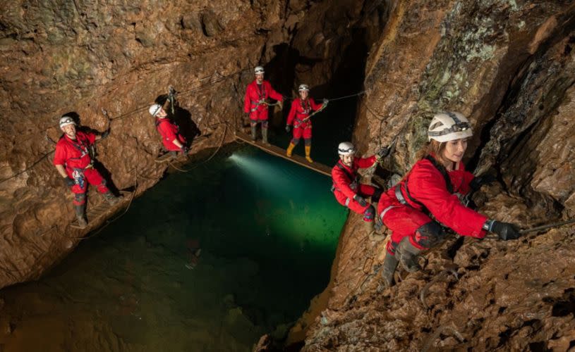 A group on the Wild Wookey caving experience in Wookey Hole - credit Wookey Hole