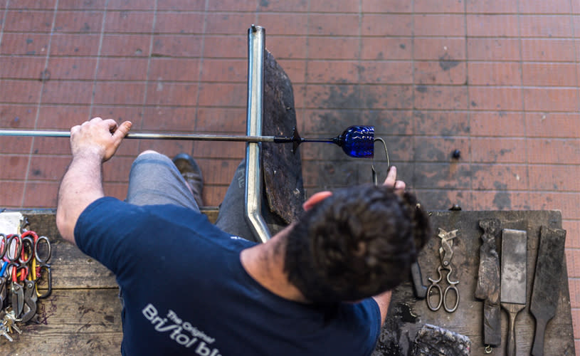Person making blue glass object - Credit Oliver Jordan
