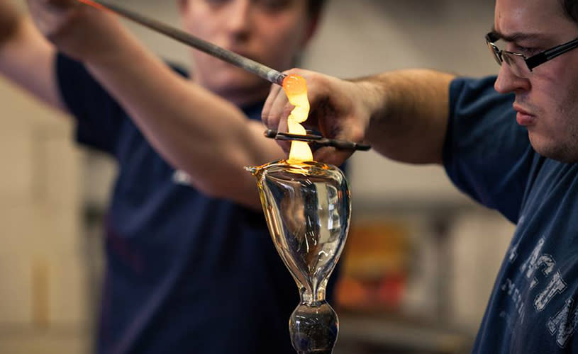Man making a glass object in workshop, credit: Bristol Blue Glass