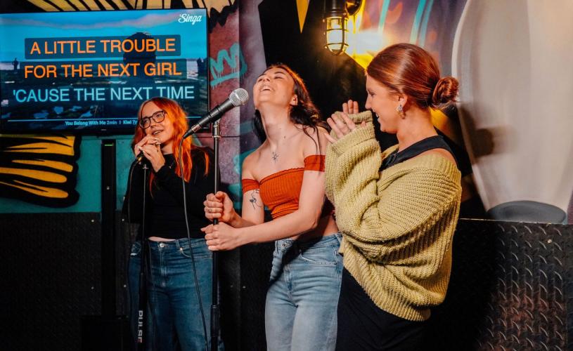 A group of women singing karaoke - credit King Pins