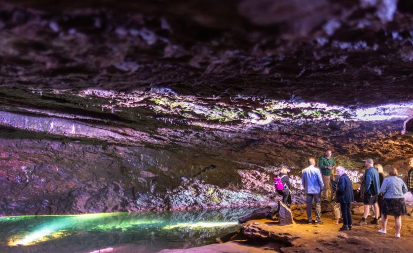 People on tour of caves in Wookey Hole near Bristol - credit Wookey Hole