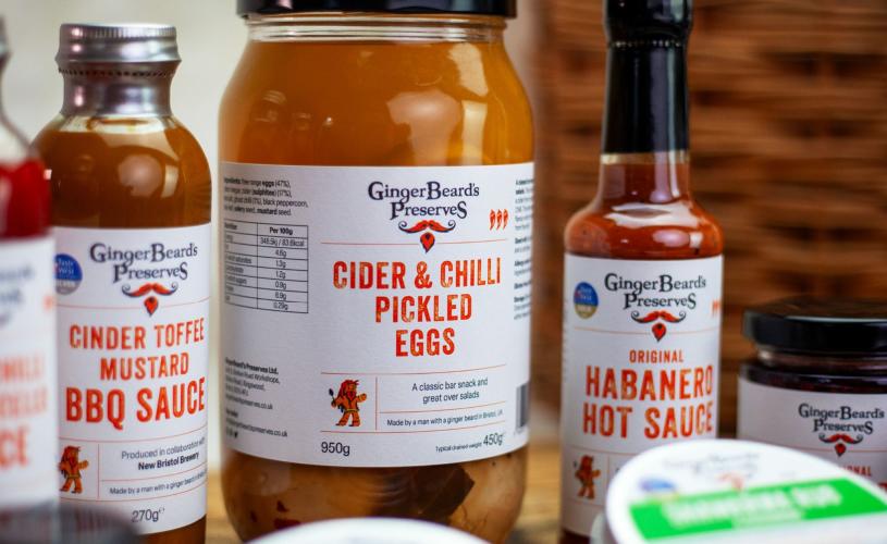 Bottles of hot sauce and jar of pickled eggs - credit GingerBeard's Preserves