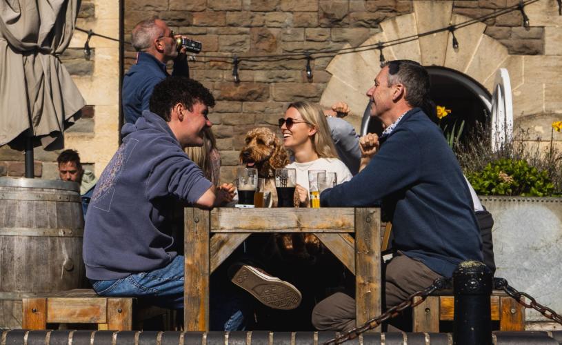People having drinks on the terrace at The Pump House in Bristol