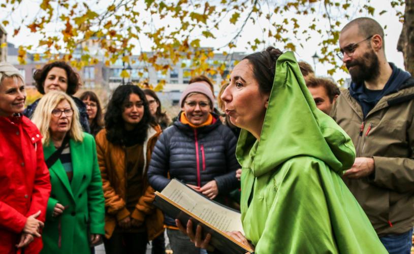 People on a walking tour with costumed guide - credit Show Of Strength Theatre Company