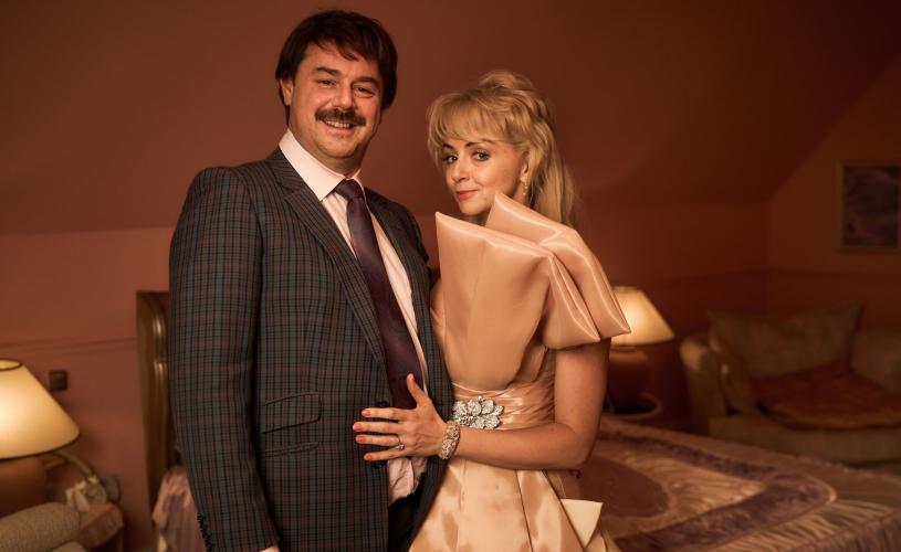 Danny Dyer as Freddie Jones and Lisa McGrillis as Valerie Jones in Rivals - credit Disney+