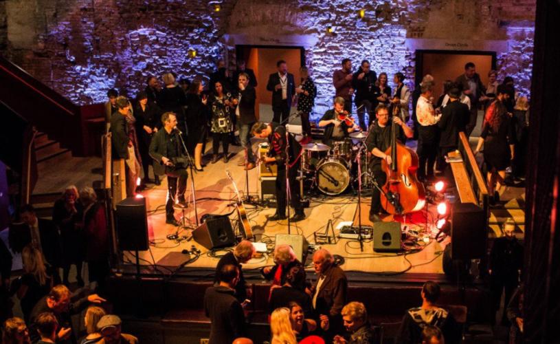 Band performing at Bristol Old Vic