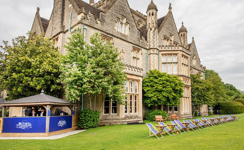 De vere Tortworth Court near Bristol exterior with outdoor bar and seating in garden - credit De vere Tortworth Court