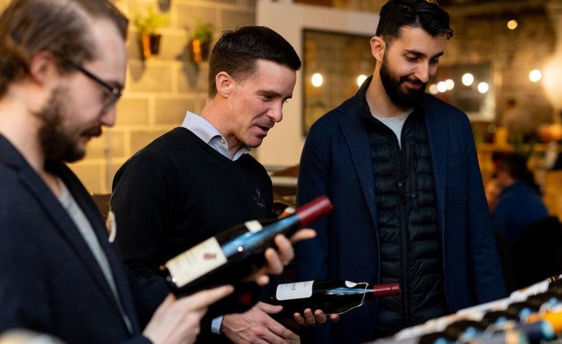 Men choosing wine from Enomatic machine at Le Vignoble Bristol - credit Le Vignoble