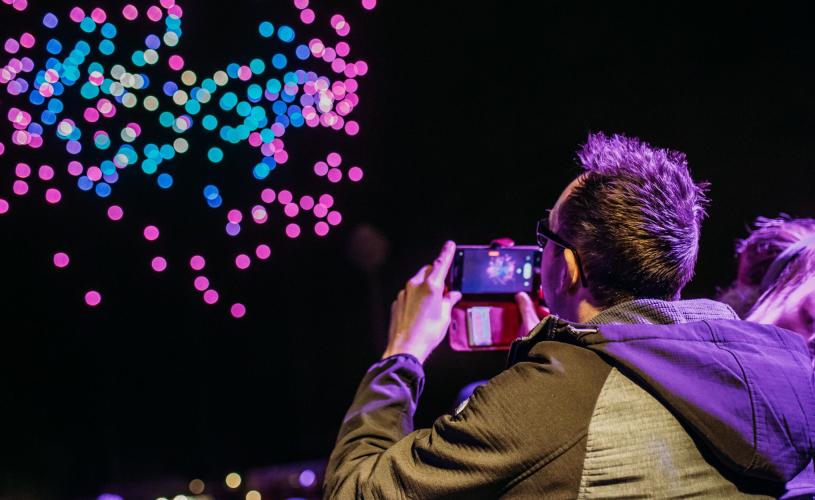 Person watching a drone show in Bristol - credit Yuup