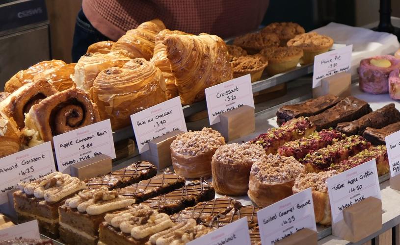 Selection of Pinkmans cakes and pastries on counter - credit Pinkmans