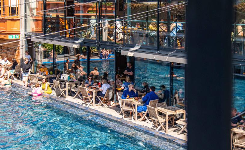 Bristol Lido people dining by pool