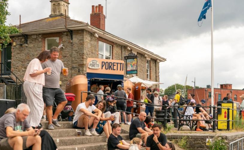 People sat outside The Cottage Inn