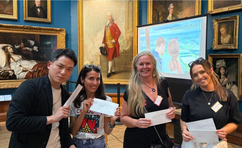 People will envelopes at Summer In Bath media event 2025