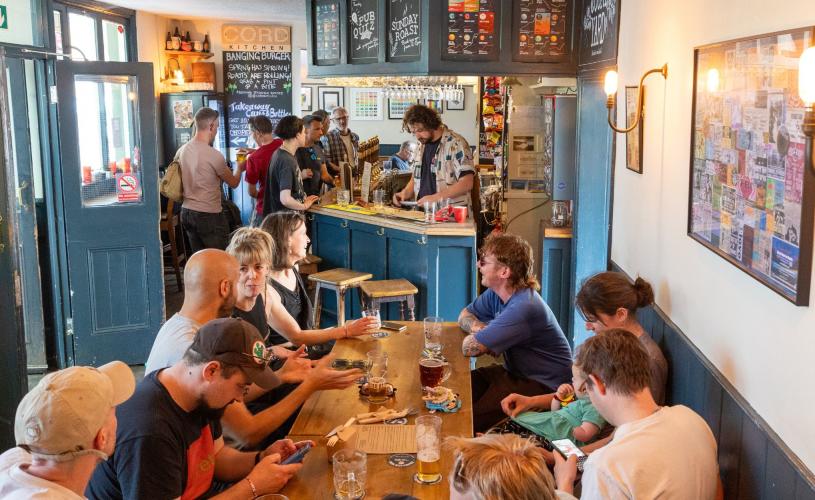 People sat inside The Barley Mow in St Phillips, Bristol - credit Bristol Beer Factory