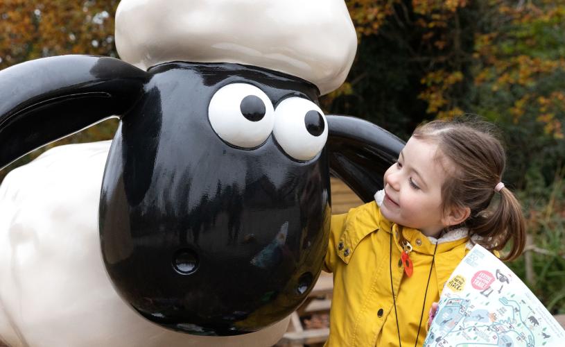Child with Shaun the Sheep statue - credit Bristol Zoo Project