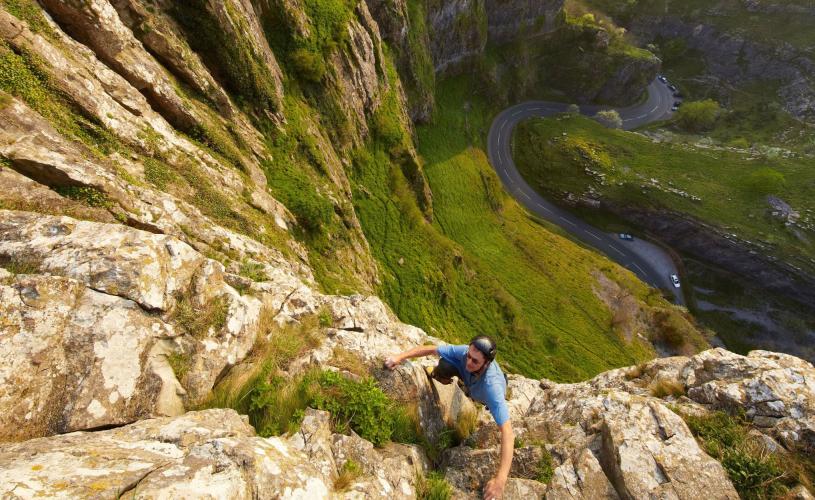 Person climbing at Cheddar Gorge & Caves, near Bristol - credit Cheddar Gorge & Caves