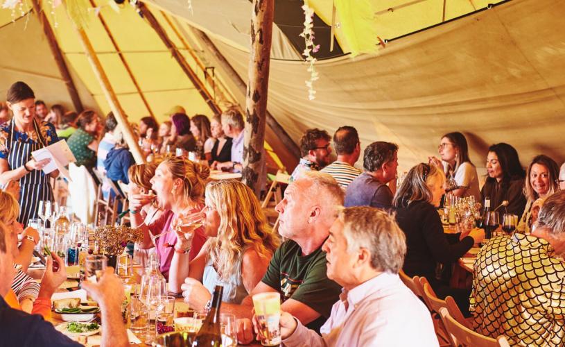 People attending at feast at Valley Fest near Bristol - credit Valley Fest
