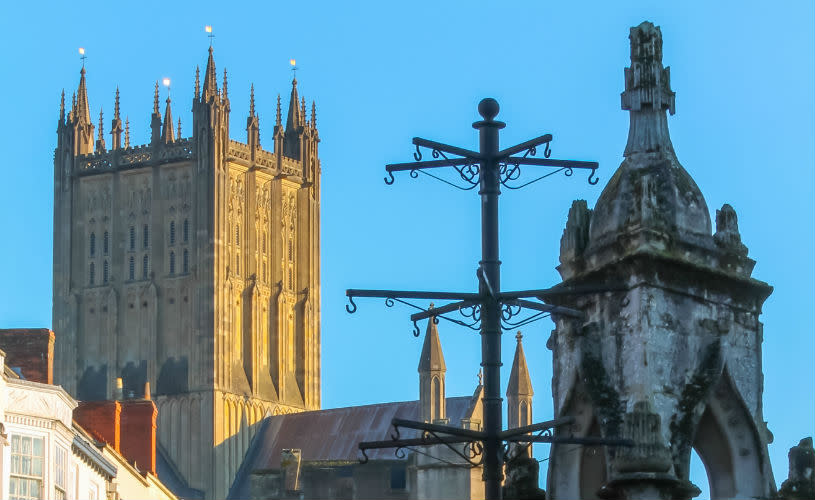 A view of the tower of Wells Cathedral from Wells Market Place