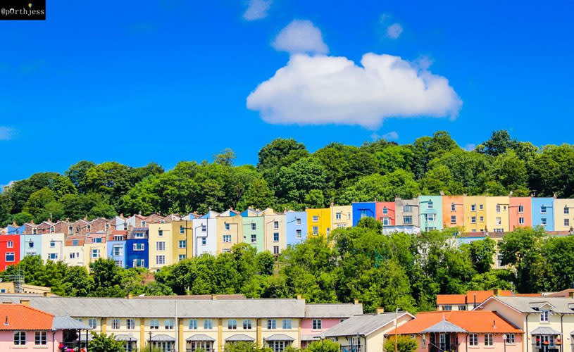 A row of multi-coloured houses in the Cliftonwood area of Bristol - credit Jess Siggers