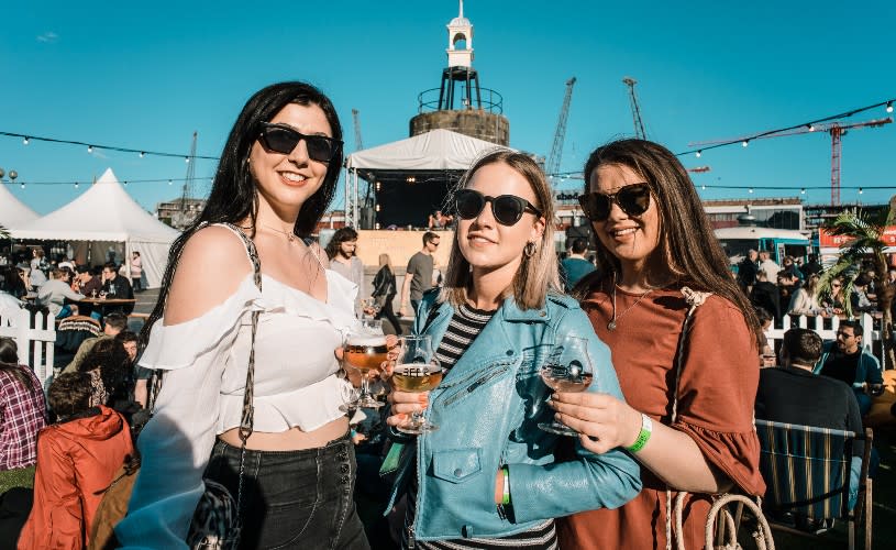 Women with drinks at festival - Credit Bristol Craft Beer Festival