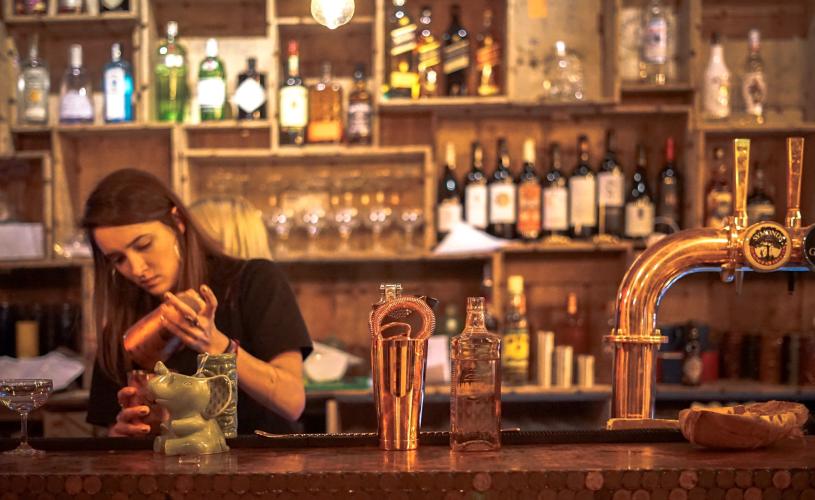 Person making cocktail at The Coconut Tree in Clifton, West Bristol - credit The Coconut Tree
