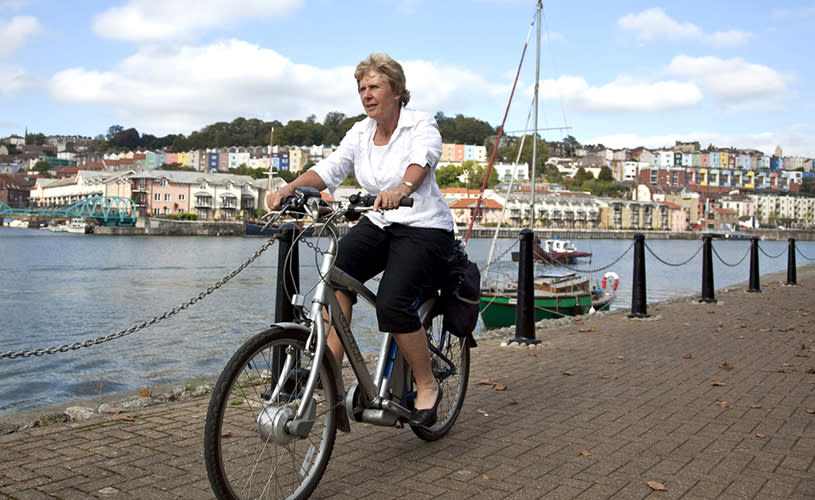 Person cycling on Harbourside - credit Chris Bahn, Bristol City Council