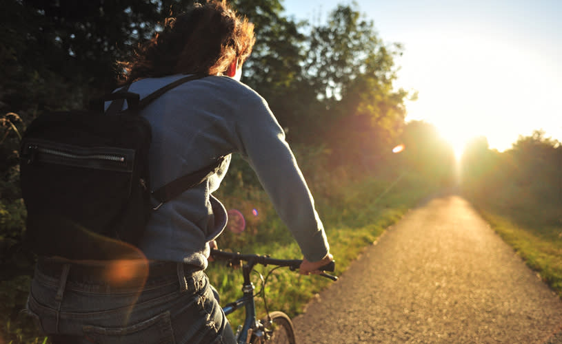 Person cycling on cycle path - credit Sustrans